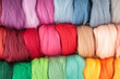 Natural wool fiber in the Balls of different bright beautiful color merino wool for handmade knitting felting close-up