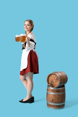 Sticker - Beautiful Octoberfest waitress with beer and barrels on blue background