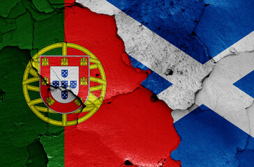 Wall Mural - flags of Portugal and Scotland  painted on cracked wall