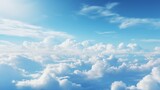 Fototapeta Niebo - Vivid blue sky adorned with fluffy white clouds
