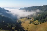 Fototapeta Tęcza - Bird's-eye misty valley in Carpathian Mountains. Generative AI