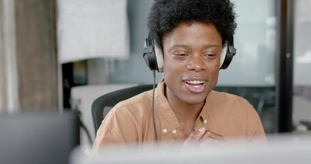 Wall Mural - happy african american man in headphones talking during live podcast, copy space, slow motion