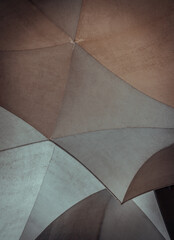 Wall Mural - Looking up at Architectural exterior design of old concrete ceiling structure. Abstract art background, Space for text, Selective focus.