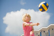 © fStop - Blonde boy playing volleyball