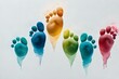 colorful steps prints on the white paper , multicolor foot prints  on concrete white background, artistic view 
