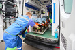 © Svitlana - Loading a stretcher with a patient into a modern ambulance
