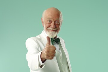Poster - A man wearing a white shirt and green tie is giving a thumbs up gesture. This image can be used to convey approval, success, positivity, or agreement in various professional and personal contexts.