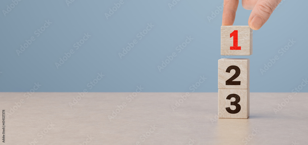 Priorities By Numbers Task priority and management concept. Wooden cube blocks with number ...