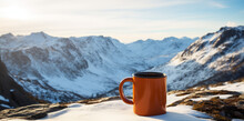 A Mug With Coffee On A Table On A Mountain Pass Against The Backdrop Of Snowy Descent From The Mountain
