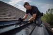 Installer Adjusting Gutter Guard on Rooftop Site with Professional Roofing Contractor
