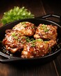 A visually stunning presentation of marinated chicken thighs, showcasing a deep, goldenbrown color from the grill, adorned with a sprinkling of green onions and toasted sesame seeds for