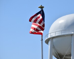 Sticker - American Flag by a Water Tower