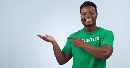 Wall Mural - Volunteer, happy black man or point at palm community service info, NGO studio and waste management notification. Eco friendly recycling, advertising or model presentation portrait on blue background