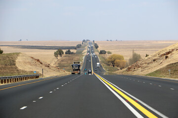 the n3 freeway from johannesburg to durban in south africa, straight road to the horizon over dry la