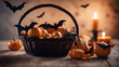 Halloween decoration with pumpkins. bats and candles on wooden background