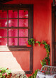 Wooden Window in a typical canarian house with colorful Pink Porch