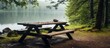 Rainy day lake picnic on a wooden table