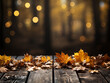Autumn leaves on enemy fall, empty grunge wooden board and sunlight. Against the backdrop of the autumn mood bokeh