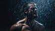 muscular man with water splashing against his face in the dark