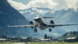 Three-engine business jet making a landing at an alpine airport.