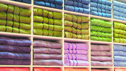 Leinwandbilder - Colorful folded towels stack, hotel service concept background