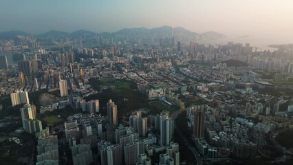 Wall Mural - Aerial video of Hong Kong city at sunset