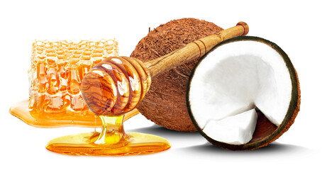 Wall Mural - coconuts, honeycomb and dripping honey isolated on white background
