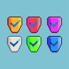Fototapete - Pixel art sets of approve shield with variation color item asset. Simple bits of shield on pixelated style. 8bits perfect for game asset or design asset element for your game design asset.