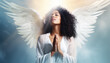 african american woman in white dress with afro curles feekinf wings of angel in her back