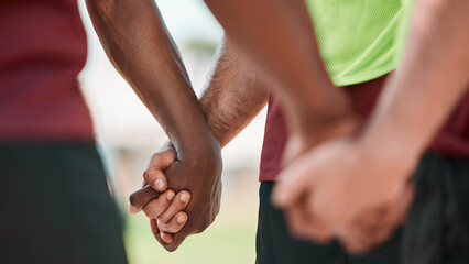 Poster - Hand, men and praying in sports group on field for training, workout or game motivation outdoor with closeup. Fitness, people or gratitude for exercise, performance or prayer with solidarity or unity