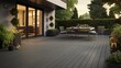 Composite decking in ash grey with two levels deck lights and ideal for a landscape gardener