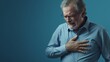 A man is holding his chest in pain.generative ai
