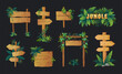 © SpicyTruffel - Cartoon game boards. Forest wood elements. UI text icons. Cute tropic banner interface. Plant frame. Blank timber billboards. Pointer signage. Leaves or lianas. Vector signboards set