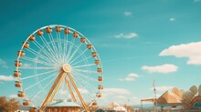 Amusement Park S Big Wheel With Blue Sky Backdrop