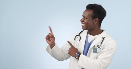 Poster - Happy black man, doctor and pointing to mockup for advertising against a studio background. Portrait of African male person, medical or healthcare surgeon showing information, notification or deal