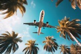 Fototapeta  - Passenger airplane flying above the tropical palm trees. Bottom view of the aircraft. Generative AI 