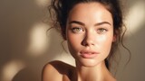 Fototapeta  - Closed up of beautiful young model face with nude make up on skin.