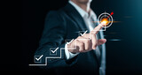 Steps and actions towards aiming business goals. Businessman touching on the goal of successful business growth and Steps for goal achievement and business success. Targeting business concept.