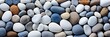 White pebble stone background texture. Stone pebbles background. Background of many pebbles. Colorful pebbles background.