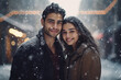 portrait of beautiful smiling young couple man and woman standing under snowing