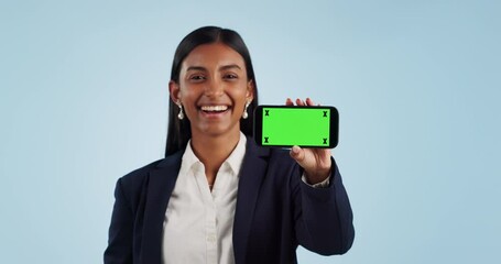 Sticker - Business woman, phone green screen and mockup for presentation or advertising information in studio. Professional face of indian employee on mobile app with website tracking marker on blue background