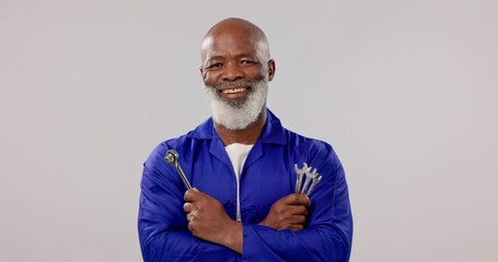 Poster - Construction worker, face and handyman tools with smile and black man in studio. Senior, industry portrait and happy contractor ready for industrial project or engineer job with white background