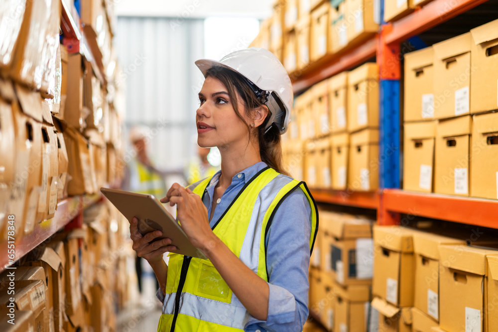 Portrait engineer woman shipping order detail check goods and supplies ...