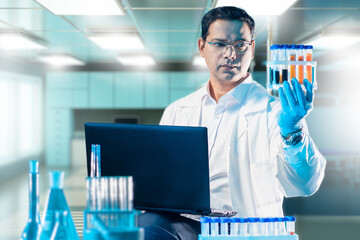 Poster - man doctor. scientist with flasks and laptop. doctor studies chemical composition of blood. plastic 