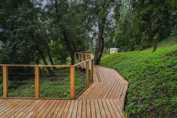 Wall Mural - wooden bridge in the park