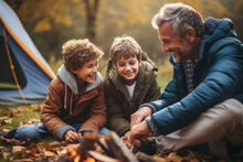 A Family Camping Trip With Grandparents Sharing Their Knowledge Of The Great Outdoors With The Younger Generation, Love And Creation
