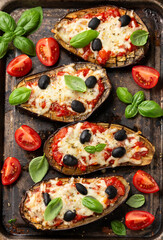 Wall Mural - Healthy Eggplant or Aubergine pizza with tomato sauce, mozzarella cheese, basil and olives