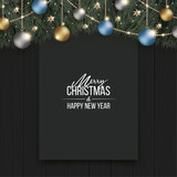 Fototapeta  - キラキラ光り輝くクリスマスの飾りと、黒の木目の背景と黒無地のボード