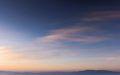 Wall Mural - clouds on the sky at twilight. beautiful nature background in colorful light at dawnv