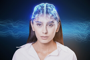 Poster - Portrait of attractive young businesswoman with creative digital brain hologram on blue background. Hi-tech innovation and AI concept.